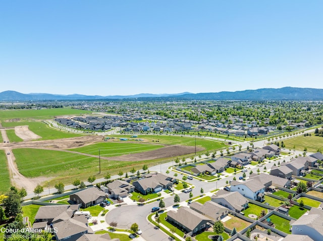4281 N Shelburne Loop, Post Falls, ID 83854 - aerial view of residential area with a mountainous background