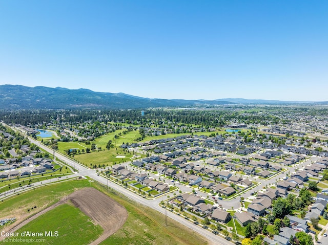 4281 N Shelburne Loop, Post Falls, ID 83854 - aerial perspective of suburban area with a water and mountain view