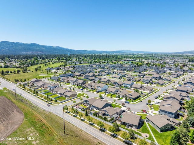 4281 N Shelburne Loop, Post Falls, ID 83854 - aerial view of residential area featuring a mountain backdrop