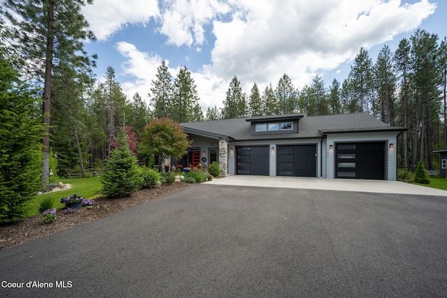 6036 W Sparrowhawk Dr, Rathdrum, ID 83858 - view of front of property featuring driveway and an attached garage