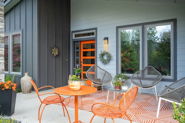 6036 W Sparrowhawk Dr, Rathdrum, ID 83858 - property entrance featuring board and batten siding