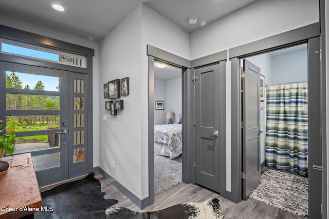 6036 W Sparrowhawk Dr, Rathdrum, ID 83858 - entryway with wood finished floors and baseboards