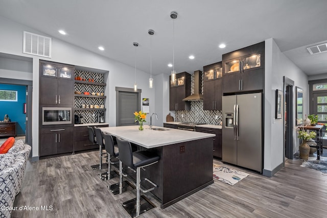 6036 W Sparrowhawk Dr, Rathdrum, ID 83858 - kitchen featuring stainless steel appliances, a sink, open shelves, wood finished floors, and recessed lighting