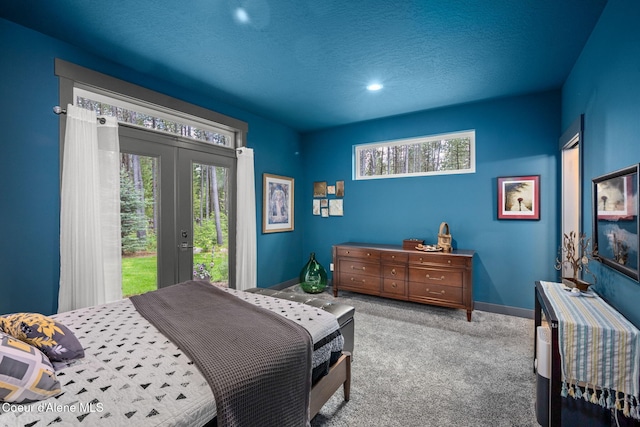 6036 W Sparrowhawk Dr, Rathdrum, ID 83858 - bedroom with access to exterior, french doors, carpet flooring, a textured ceiling, and baseboards