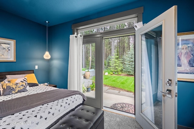 6036 W Sparrowhawk Dr, Rathdrum, ID 83858 - bedroom featuring access to exterior and carpet
