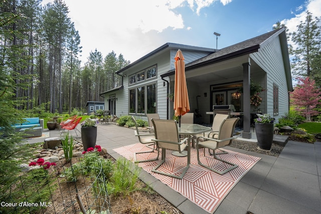 6036 W Sparrowhawk Dr, Rathdrum, ID 83858 - view of patio featuring outdoor dining area