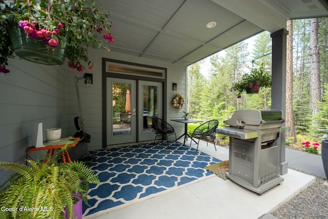 6036 W Sparrowhawk Dr, Rathdrum, ID 83858 - view of patio / terrace with french doors and grilling area