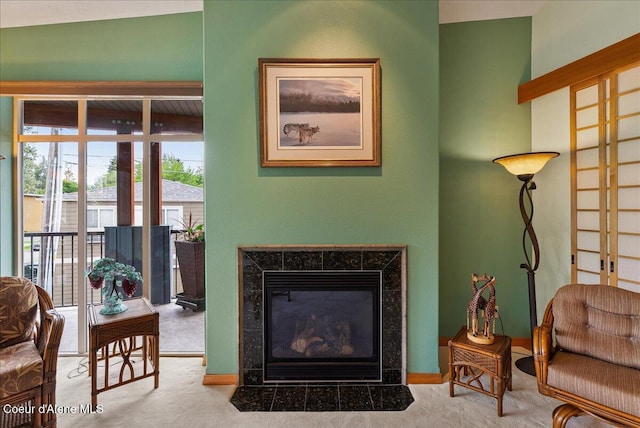 1010 E Mullan Ave Unit 202, Coeur Dalene, ID 83814 - carpeted living room with a fireplace