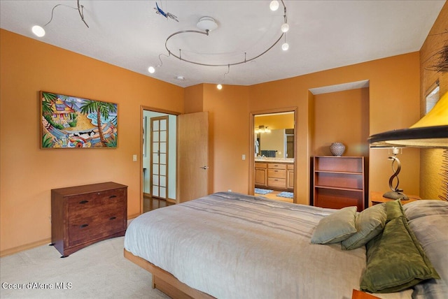 1010 E Mullan Ave Unit 202, Coeur Dalene, ID 83814 - bedroom featuring carpet floors and connected bathroom
