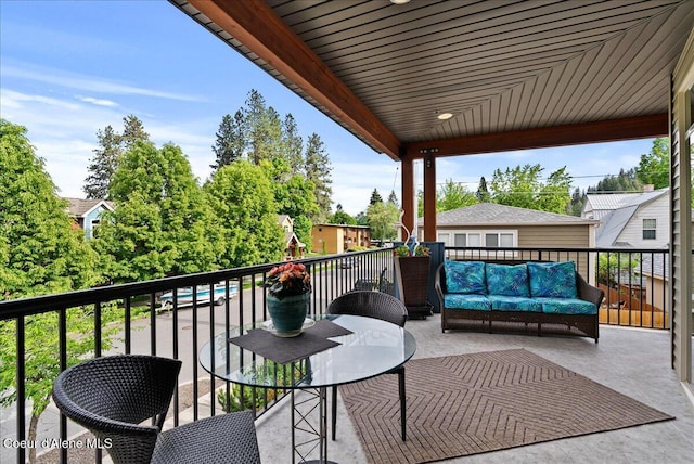 1010 E Mullan Ave Unit 202, Coeur Dalene, ID 83814 - balcony featuring an outdoor hangout area