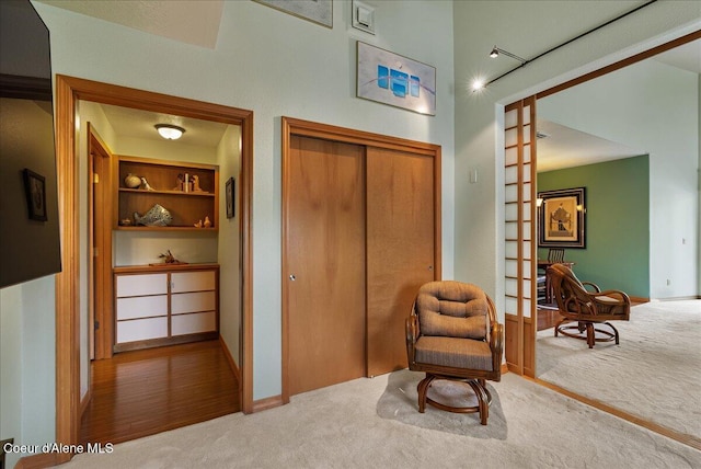 1010 E Mullan Ave Unit 202, Coeur Dalene, ID 83814 - living area with carpet floors and baseboards