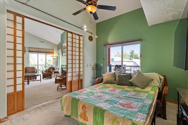 1010 E Mullan Ave Unit 202, Coeur Dalene, ID 83814 - bedroom featuring lofted ceiling, carpet, and access to outside