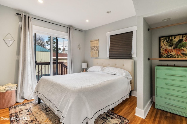 721 N A St, Coeur Dalene, ID 83814 - bedroom featuring access to exterior, wood finished floors, baseboards, and recessed lighting