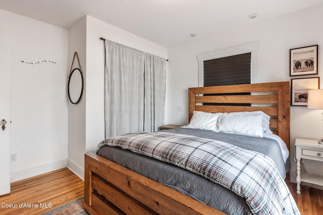 721 N A St, Coeur Dalene, ID 83814 - bedroom featuring wood finished floors and baseboards