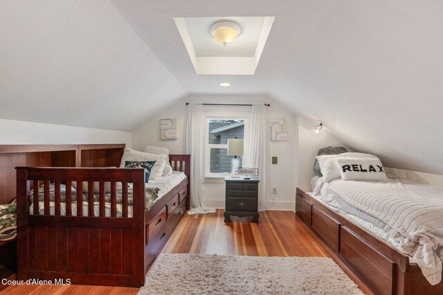 721 N A St, Coeur Dalene, ID 83814 - bedroom with wood finished floors and vaulted ceiling