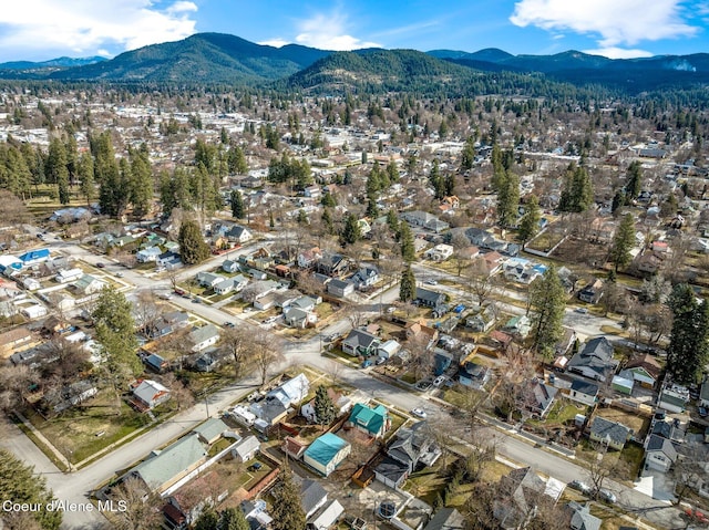 721 N A St, Coeur Dalene, ID 83814 - aerial view of property's location with a mountainous background and nearby suburban area