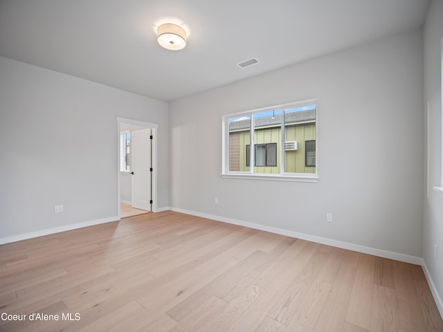 997 E Railroad Ave, Post Falls, ID 83854 - spare room with light wood-style floors and baseboards