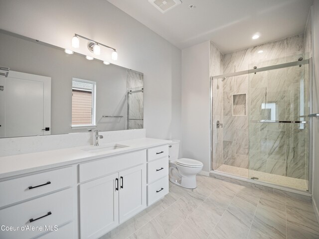 997 E Railroad Ave, Post Falls, ID 83854 - full bathroom with vanity, toilet, a marble finish shower, and recessed lighting