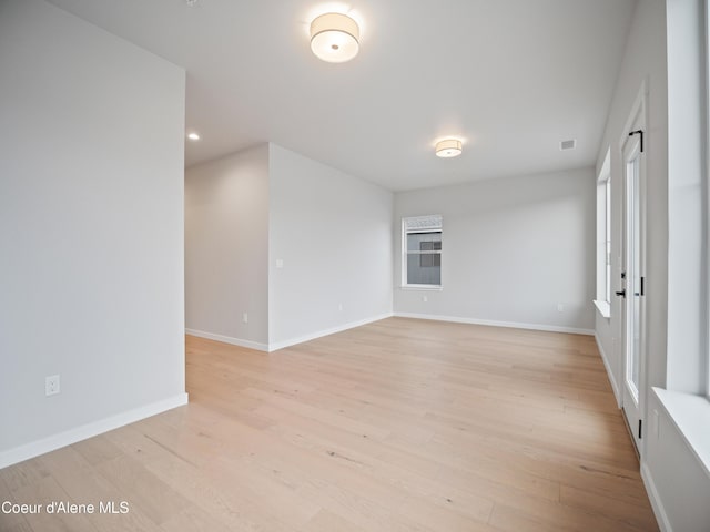 997 E Railroad Ave, Post Falls, ID 83854 - spare room featuring light wood-style flooring, baseboards, and recessed lighting