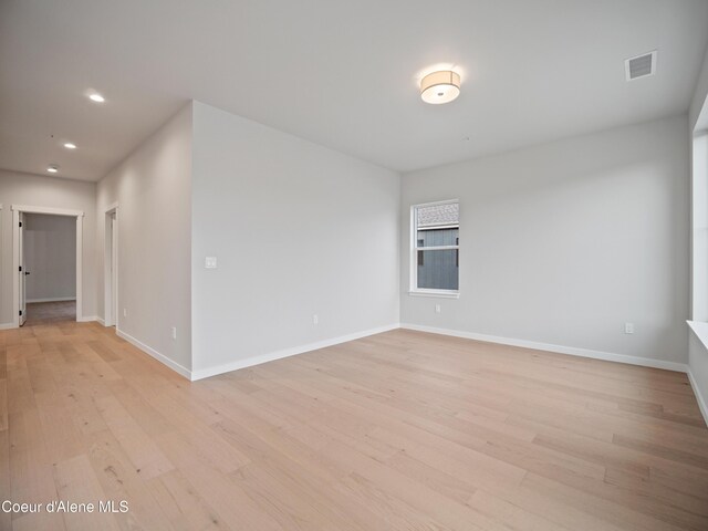 997 E Railroad Ave, Post Falls, ID 83854 - unfurnished room featuring light wood finished floors, recessed lighting, and baseboards