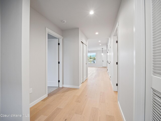 997 E Railroad Ave, Post Falls, ID 83854 - hallway with light wood-style floors, recessed lighting, and baseboards