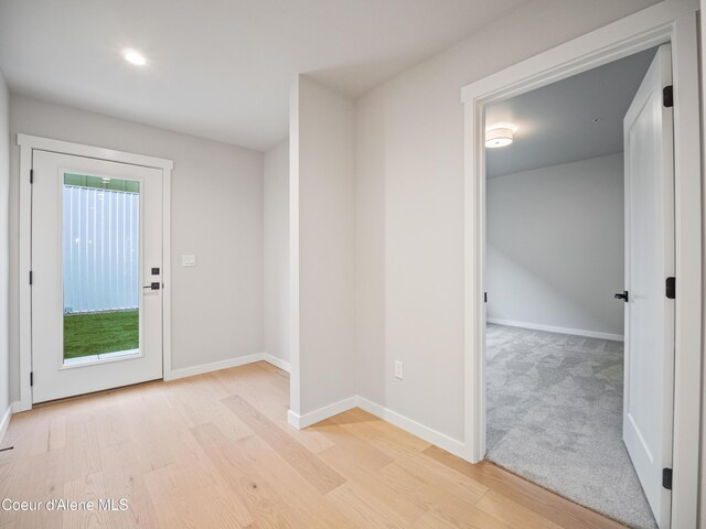 997 E Railroad Ave, Post Falls, ID 83854 - doorway featuring light wood-style flooring, baseboards, and recessed lighting