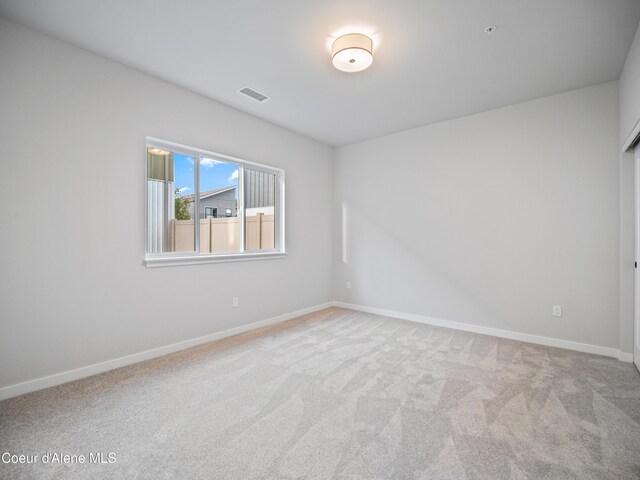 997 E Railroad Ave, Post Falls, ID 83854 - spare room with carpet floors and baseboards