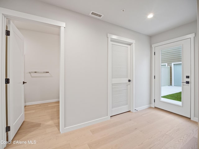 997 E Railroad Ave, Post Falls, ID 83854 - unfurnished bedroom with light wood-style floors, baseboards, and recessed lighting