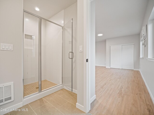 997 E Railroad Ave, Post Falls, ID 83854 - bathroom with a shower stall, baseboards, and recessed lighting