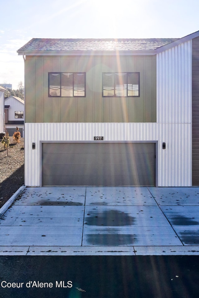 997 E Railroad Ave, Post Falls, ID 83854 - modern home with concrete driveway