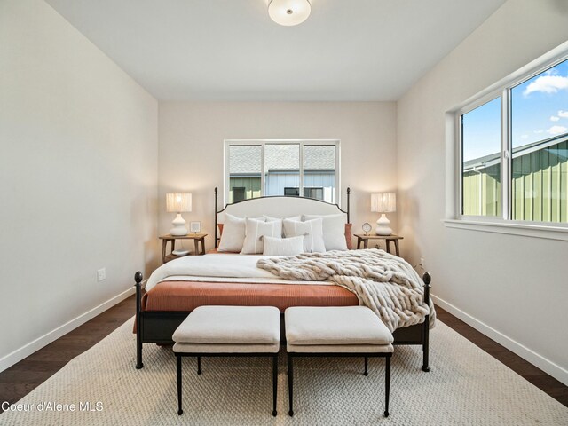 1031 E Railroad Ave, Post Falls, ID 83854 - bedroom with baseboards and wood finished floors