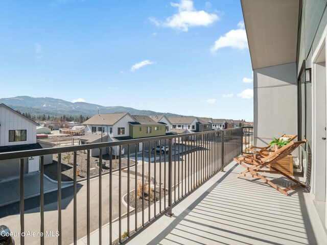 1031 E Railroad Ave, Post Falls, ID 83854 - balcony featuring a residential view and a mountain view