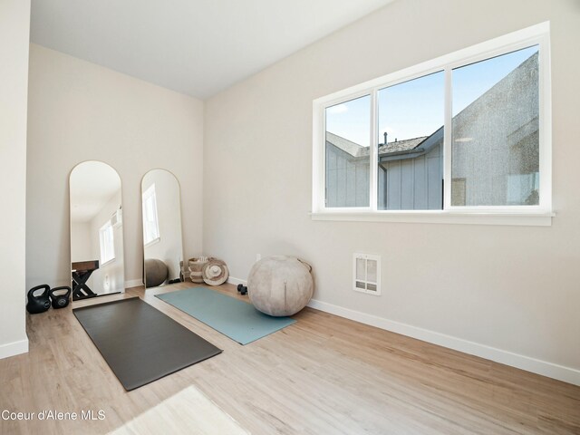 1031 E Railroad Ave, Post Falls, ID 83854 - workout room with wood finished floors and baseboards
