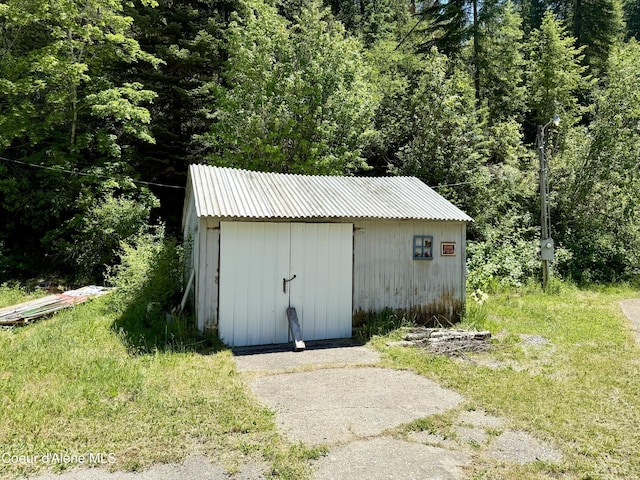 1068 Moon Gulch Rd, Kellogg, ID 83837 - view of shed with a wooded view