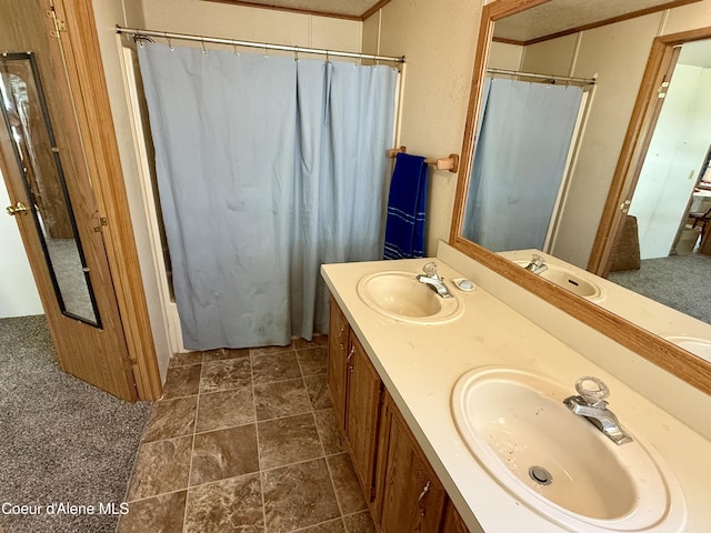 1068 Moon Gulch Rd, Kellogg, ID 83837 - full bathroom with double vanity, a shower with curtain, and ornamental molding