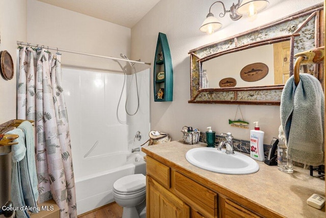 17461 N Right Fork Rd, Hauser, ID 83854 - bathroom with toilet, vanity, shower / tub combo with curtain, and wood finished floors