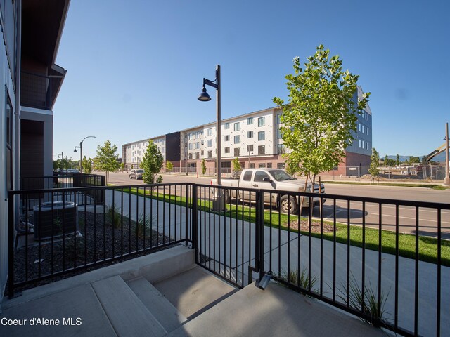 1008 E 4th Ave # 104, Post Falls, ID 83854 - balcony featuring central AC unit