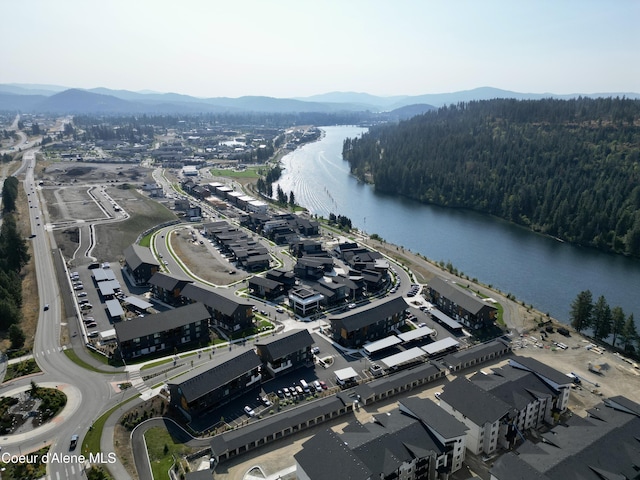 2735 W Lumber Ln, Coeur Dalene, ID 83814 - aerial overview of property's location with a water and mountain view and a heavily wooded area