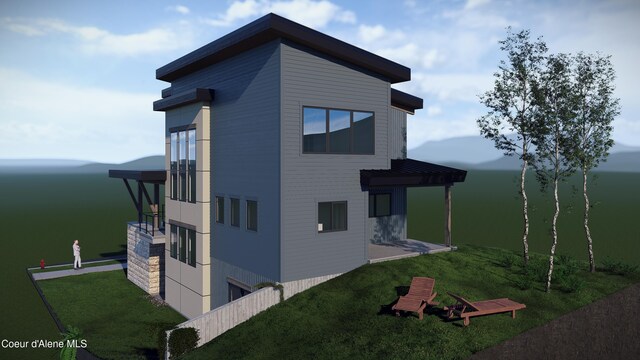 2761 W Lumber Ln, Coeur Dalene, ID 83814 - view of home's exterior featuring a water view and a yard