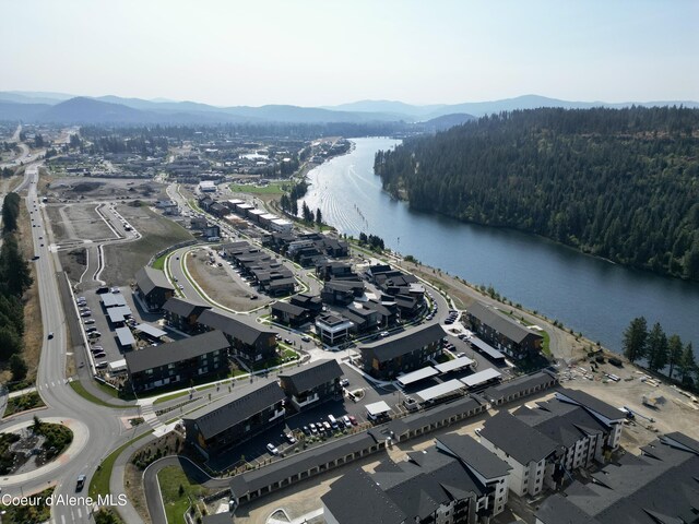 2761 W Lumber Ln, Coeur Dalene, ID 83814 - aerial overview of property's location featuring a water and mountain view and a heavily wooded area