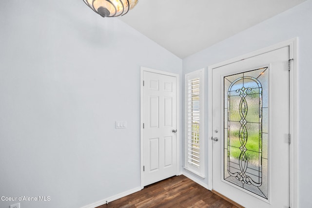 2619 N Tiatan St, Post Falls, ID 83854 - foyer entrance with vaulted ceiling, dark wood-style flooring, and baseboards