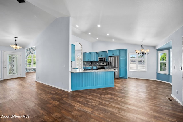 2619 N Tiatan St, Post Falls, ID 83854 - kitchen with appliances with stainless steel finishes, blue cabinetry, a chandelier, dark wood-type flooring, and recessed lighting