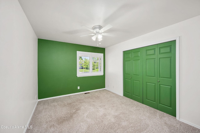 2619 N Tiatan St, Post Falls, ID 83854 - unfurnished bedroom featuring carpet floors, baseboards, and a closet