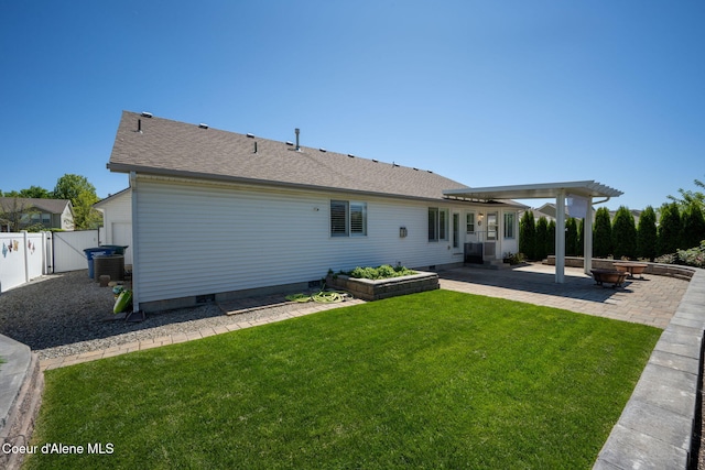 2619 N Tiatan St, Post Falls, ID 83854 - back of house featuring a patio, a pergola, an outdoor fire pit, central AC unit, and crawl space