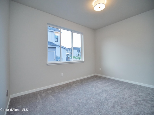 928 E Railroad Ave, Post Falls, ID 83854 - unfurnished room featuring carpet and baseboards