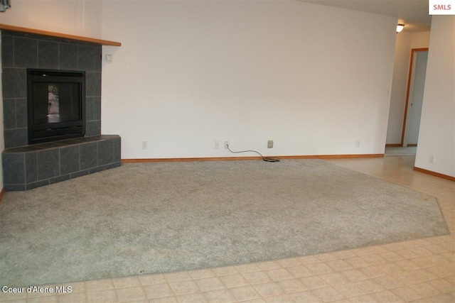 1601 Sequoia St, Sandpoint, ID 83864 - unfurnished living room with carpet floors and baseboards