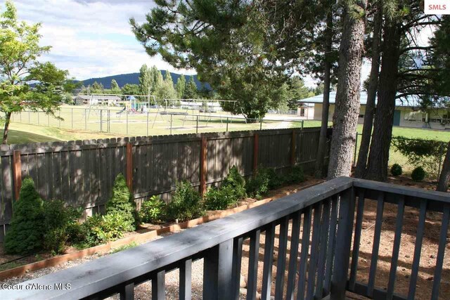 1601 Sequoia St, Sandpoint, ID 83864 - wooden terrace featuring a mountain view