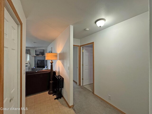 1601 Sequoia St, Sandpoint, ID 83864 - hall featuring baseboards and light colored carpet
