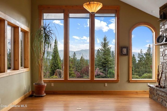 295 Sky Meadow Ln, Sagle, ID 83860 - unfurnished sunroom with a mountain view and lofted ceiling