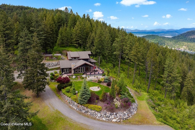 295 Sky Meadow Ln, Sagle, ID 83860 - aerial view of property and surrounding area featuring a forest and a mountainous background